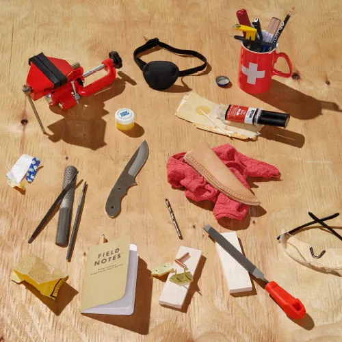 Using the Knife Making Kit Crate in a workshop, with first aid on hand for the clumsy dad.