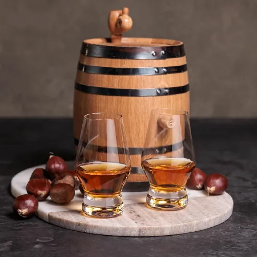 Whiskey barrel and glasses.